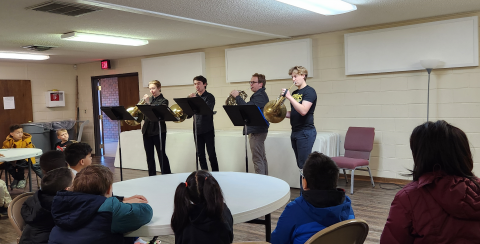 Ms. Devon Stone, Band Teacher, and her visiting horn quartet